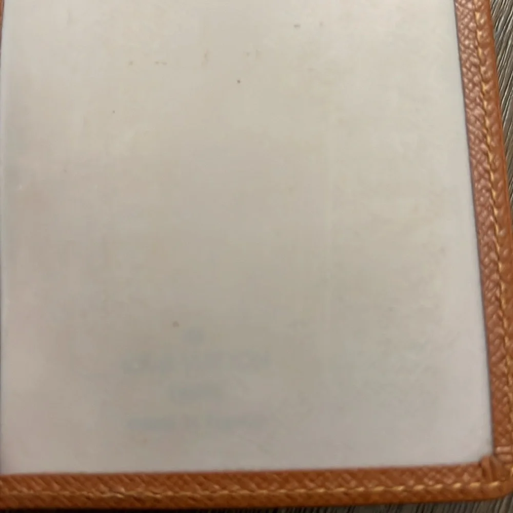 Authentic Louis Vuitton brown taiga leather bifold card I.D. Holder